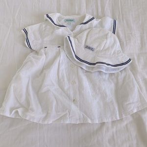 White dress with navy blue stripe details